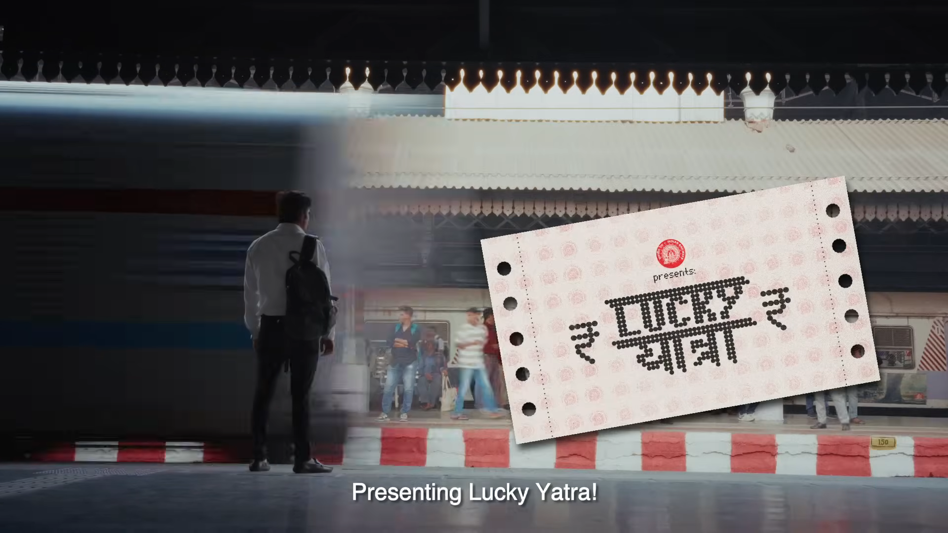 기차가 지나가는 장면에서 "Lucky Yatra"라는 문구가 새겨진 티켓이 표시됨